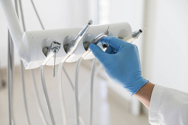 Professional Tooth Extraction technician working in Glouster, OH